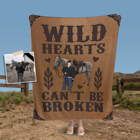 Person holding a personalized Ecomartists Custom Wild Hearts Horse Blanket with the phrase "wild hearts can't be broken" printed on it, alongside images of a horse and rider.
